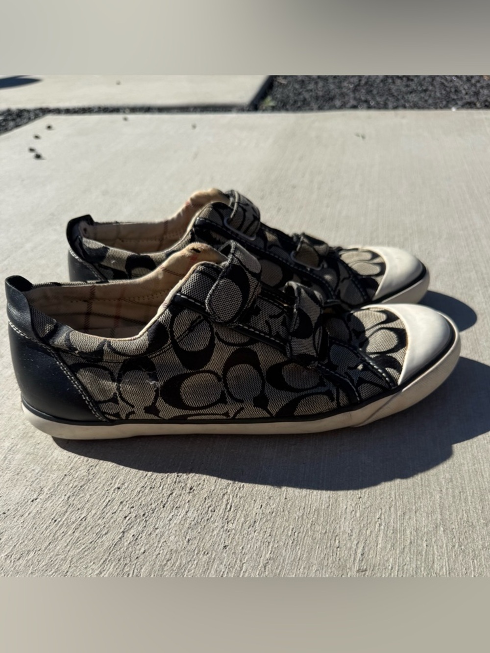 Coach Woman’s Black and Cream Signature Slip-On Velcro Sneakers